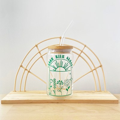 16oz Glass Beer Can Shaped Cup with Green arch design that says "Grow With Grace" and has a sunshine and flowers. Grow With Grace Plants Glass Cup