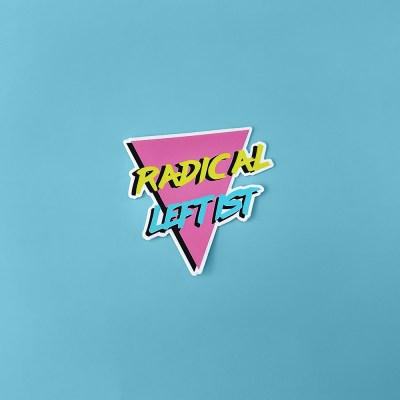 90s Retro designed sticker in yellow, turquoise and pink with text Radical Leftist